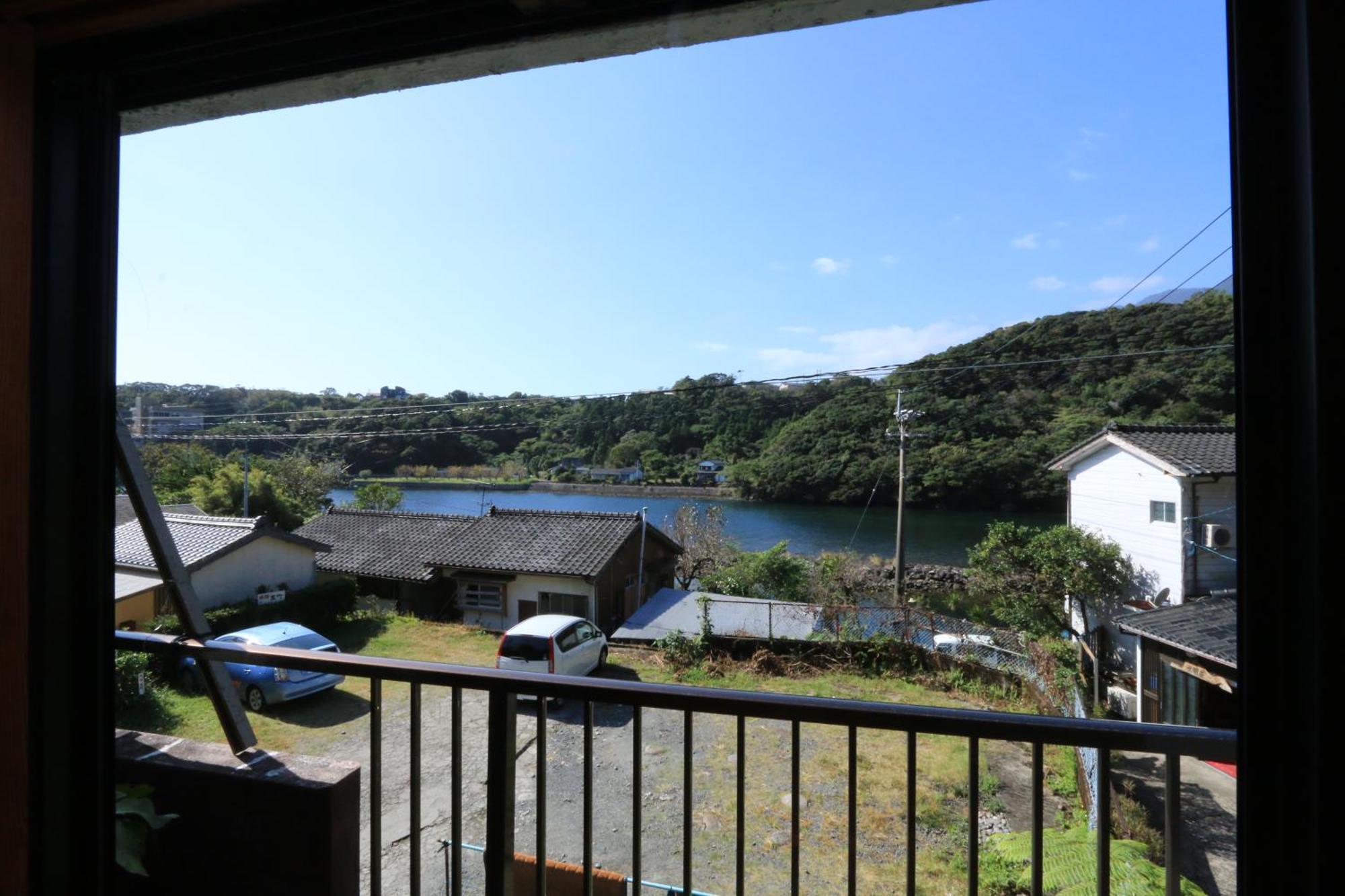 Minshuku Satomachi Guest House Yakushima  Bagian luar foto